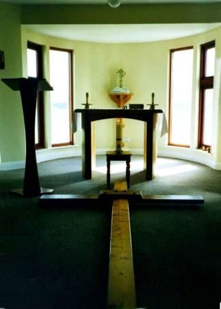 The cross is laid to rest in the chapel at Cnoc a'Chalmain