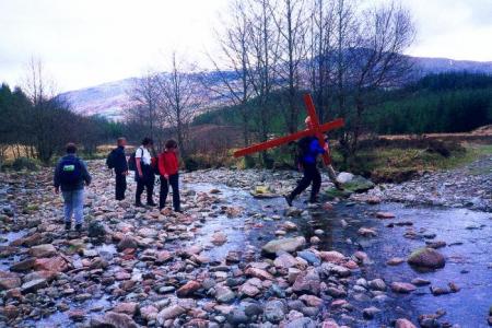 Pilgrims negotiate the Glen Orchy stepping stones!